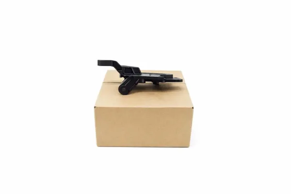 Consola (adaptador) de fixação da luz dianteira esquerda 2536201700 Mercedes