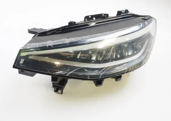 Luz esquerda 11B941029 VAG