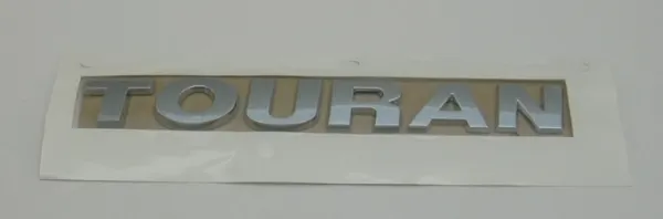 Emblema de tampa de porta-malas (emblema de firma) 1T0853687C739 VAG