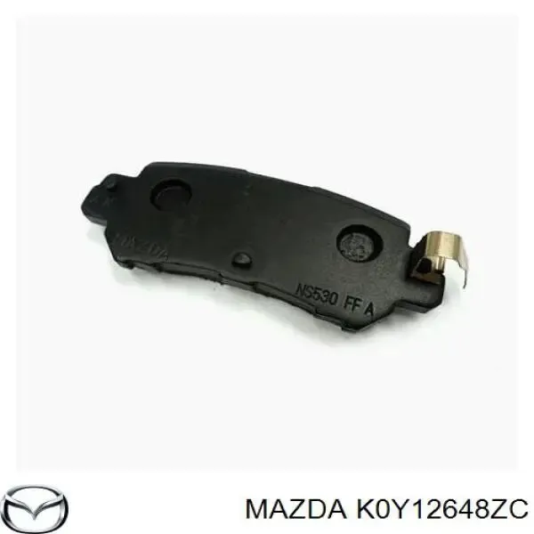 Compre K0Y12648ZC Mazda Sapatas do freio traseiras de disco