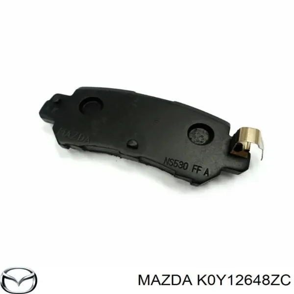 Compre K0Y12648ZC Mazda Sapatas do freio traseiras de disco