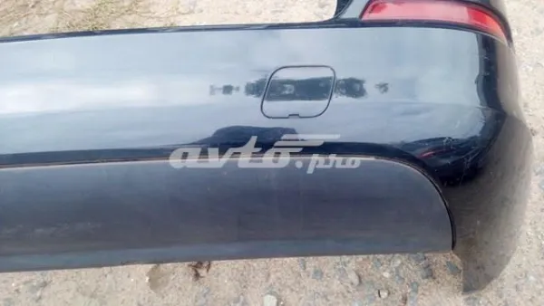 Pára-choque traseiro 13325137 General Motors