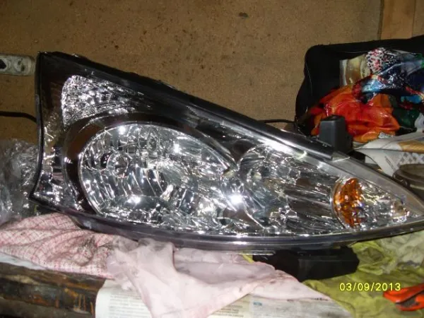 Luz direita Mitsubishi Grandis NAW