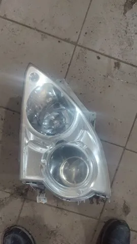 Luz esquerda 92103H1021 General Motors