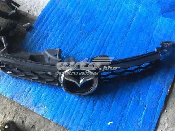 Grelha do radiador EH4450710C Mazda