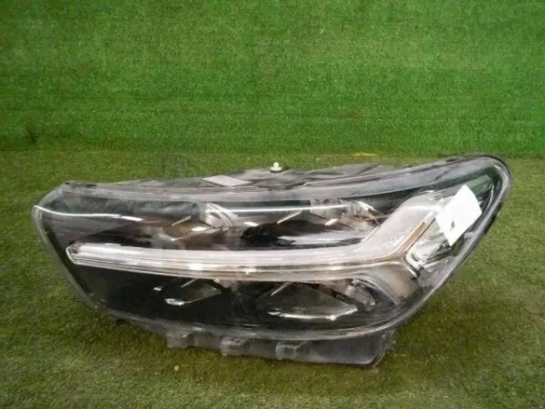 Luz esquerda 31655989 Volvo
