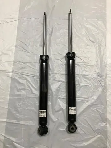 Compre KN1C28700B Mazda Amortecedor traseiro