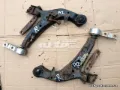 Braço oscilante inferior direito de suspensão dianteira Nissan Primera P12