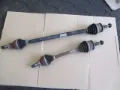 Semieixo (acionador) dianteiro esquerdo Opel Astra 